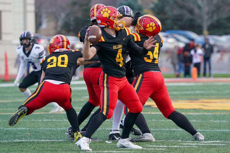Batavia's Bodi Anderson (4) looks downfield during a class 7A quarterfinal playoff football game against Downers Grove North at Batavia High School on Saturday, Nov. 16, 2024.