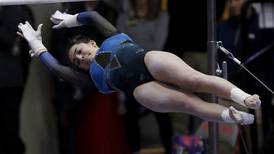Gymnastics: Downers Grove co-op in first, Geneva third after first day of state meet