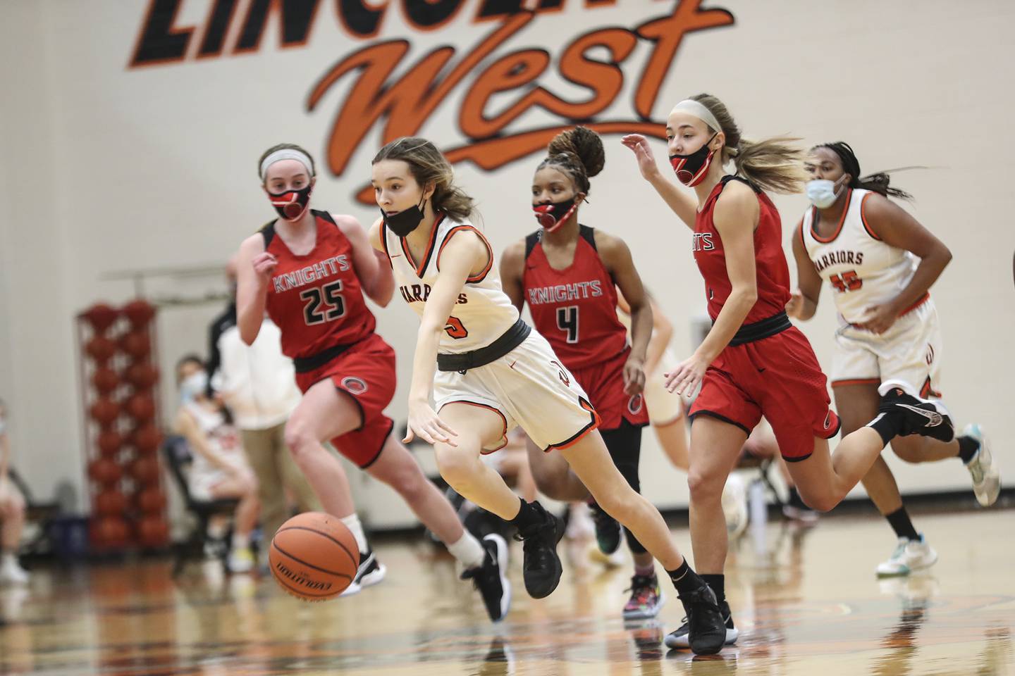 Lincoln-Way West's Ava Gugliuzza dribbles during a fast break.