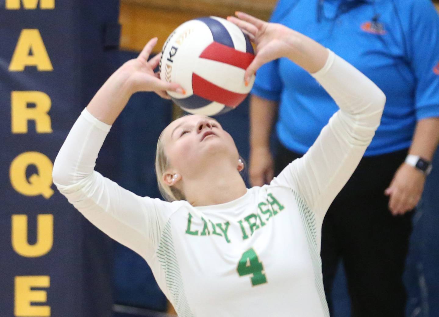 Seneca's Lainie Olson sets the ball in the air against Henry-Senachwine during the Tri-County Conference Championship game on Thursday, Oct. 17, 2024 in Bader Gym at Marquette High School.