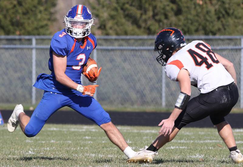 Genoa-Kingston's Brody Engel puts a move on Elmwood’s Gavin Buhl during their first round playoff game Saturday, Oct. 29, 2022, at Genoa-Kingston High School.
