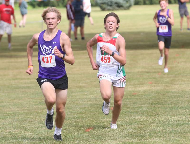 Dixon's Jaron Greve pulls ahead of L-P's Gianni Verucchi to take third place during the Gary Coates Invitational cross country meet on Saturday, Sept. 13, 2025 at Zearing Park in Princeton .