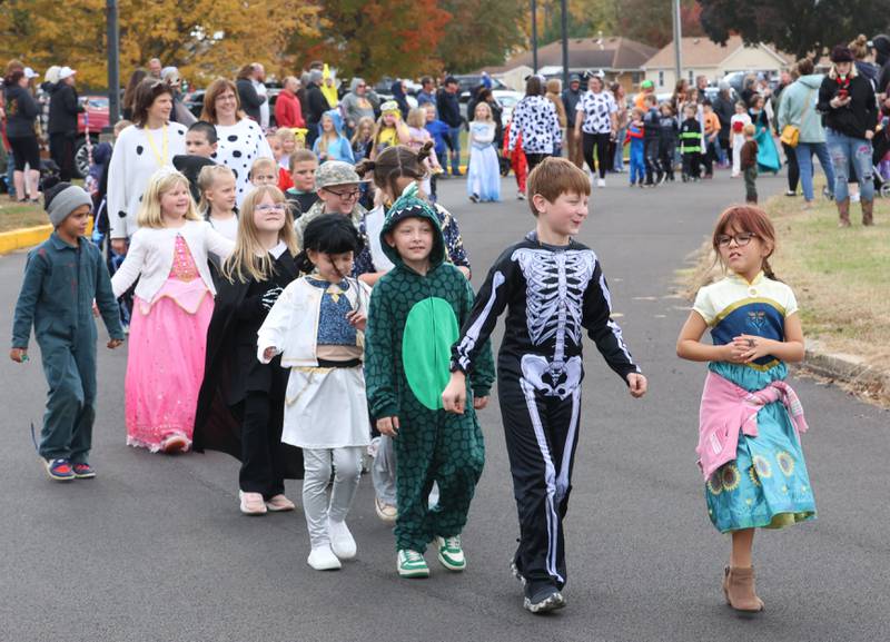 Students from Jefferson Elemertary walk around the school during a Halloween parade on Friday, Oct. 31, 2025 in Princeton.