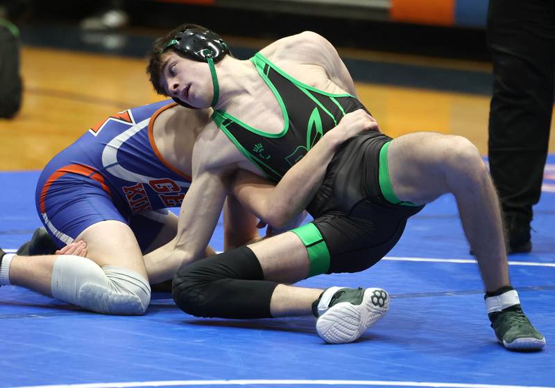 Rock Falls’ Logan Williamson tries to get position against Genoa-Kingston's Anthony Gum Thursday, Jan. 16, 2025, during their 150 pound match at Genoa-Kingston High School.