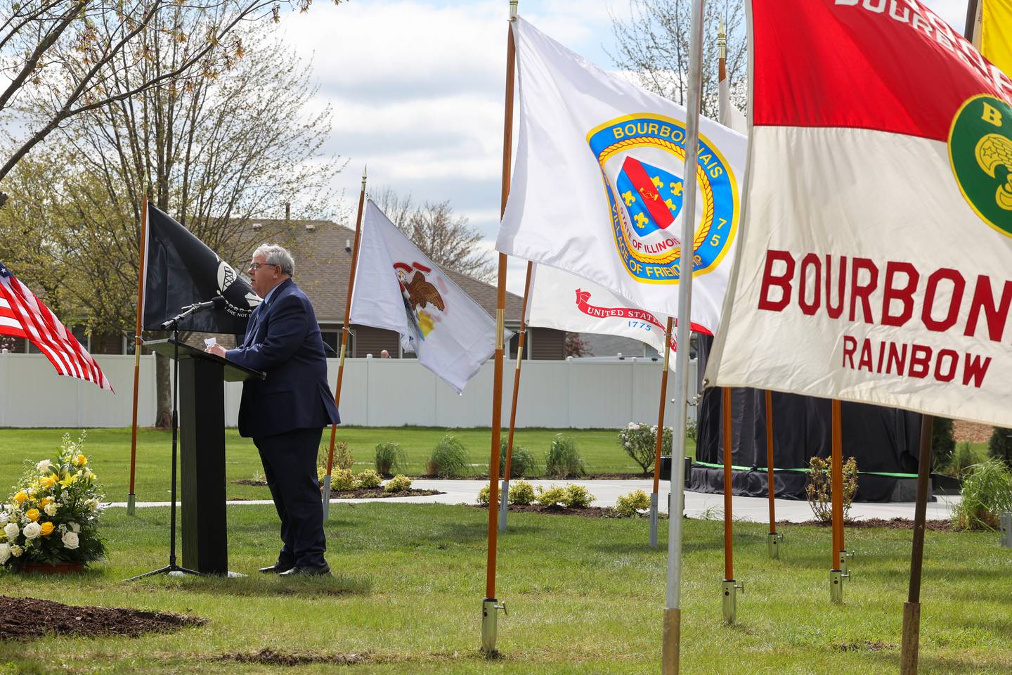 Bourbonnais Mayor Paul Schore speaks during the Gold Star Families Memorial Monument dedication ceremony at Marcotte Park in Bourbonnais on Saturday, April 26, 2025. The project was planned and fundraised for by 17-year-old Alexis McCullough, of Bourbonnais, for her Eagle Scout project in honor of her father, Col. Mark McCullough.