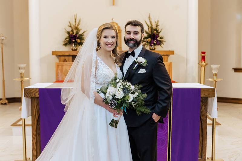 Lockport native Abigail Rodewald Brown was the fifth generation of women in her family to get married at St. Joseph Catholic Church in Lockport. She is pictured with her husband William on their wedding day, Saturday, Dec. 2, 2022.