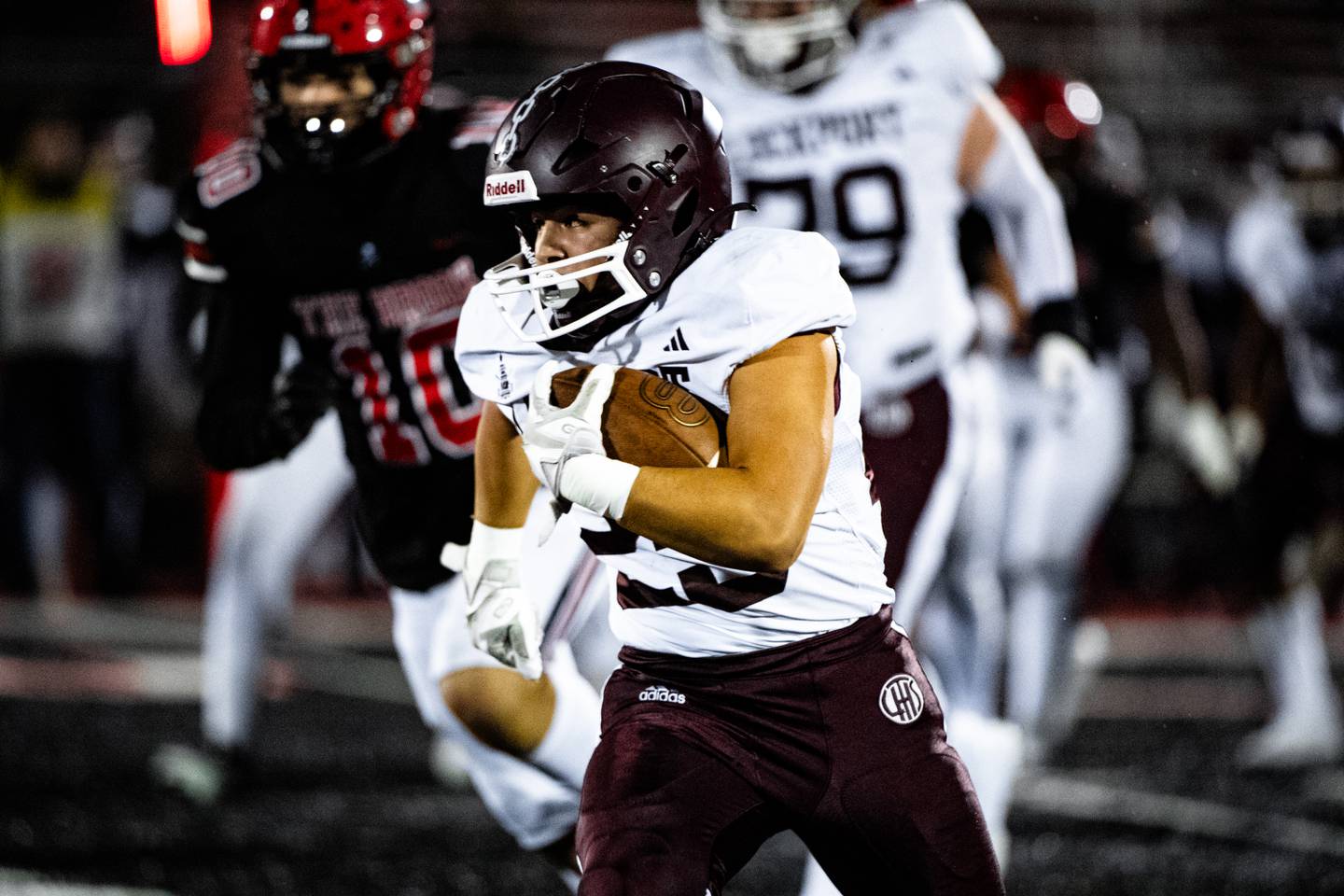 Lockport's Aidan Preciado runs a play during a game against Bolingbrook on Friday Oct. 13, 2023 at Bolingbrook High School