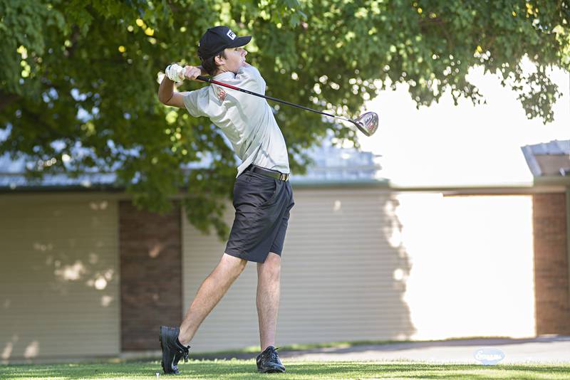 Ottawa's Seth Cooper drives off the tee on no. 10 at Emerald Hill in Sterling for the Class AA IHSA sectional golf meet.