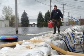 Firefighters busy keeping pumps fueled as Mississippi River crests in Savanna.
