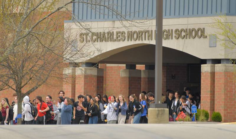 St Charles North students hold a walk-out on on Friday, April 21, 2023 in support of their teachers who are being involuntarily transferred at the end of the year.