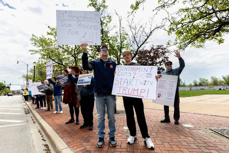 New Lenox resident Sean Marino and his son, Branden, participate in the May Day Weekend Rally in Downtown Joliet on May 3, 2025.