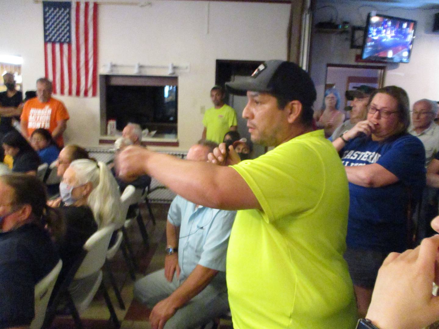 ismael Pinero questions how an apartment house for registered sex offenders could be permitted within blocks of Cunningham Elementary School during the meeting of the Cunningham Neighborhood Council in Joliet on June 1, 2022.