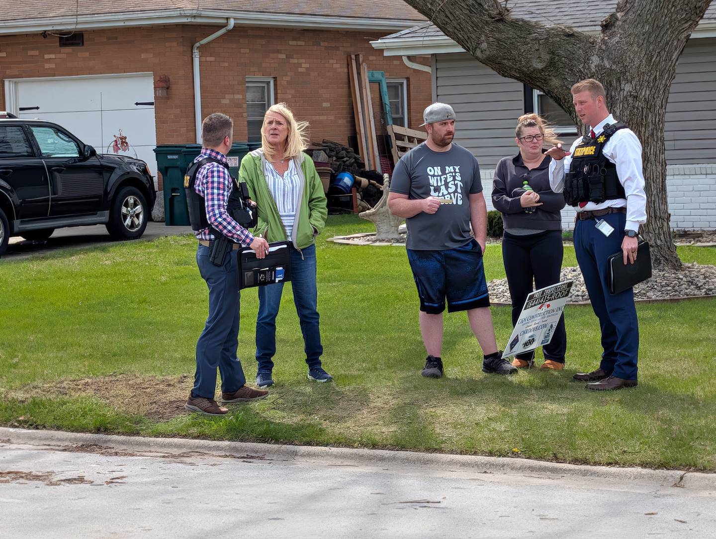 Illinois State Police investigators talk to Jonette Avenue residents following the shooting April 8, 2026.