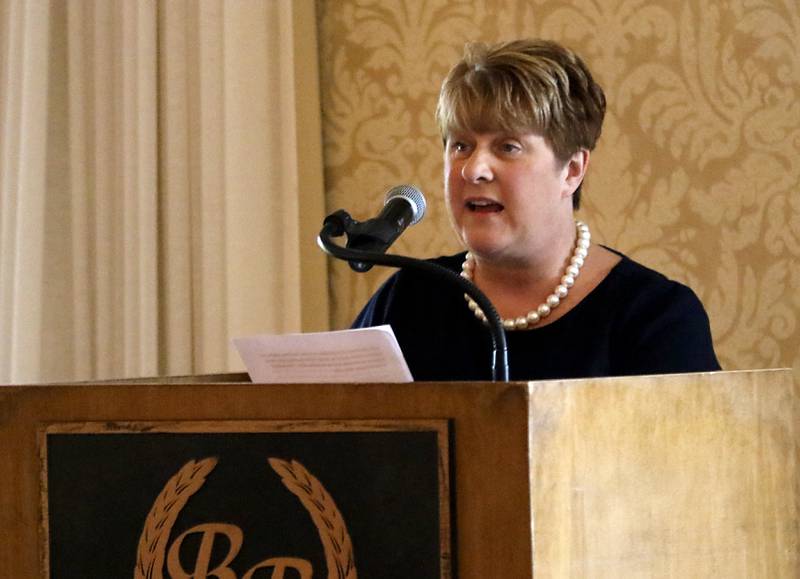 Award recipient Carol Lynn DeFiore speaks during the Northwest Herald's Women of Distinction award luncheon Wednesday June 7, 2023, at Boulder Ridge Country Club, in Lake in the Hills. The luncheon recognized 10 women in the community as Women of Distinction.