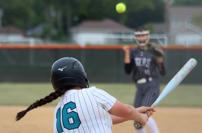 Woodstock North’s Kylee Nicholson sends the ball up the middle against Crystal Lake Central in IHSA Class 3A Regional Title Game softball action on Saturday, May 23, 2026 at Crystal Lake Central High School in Crystal Lake.