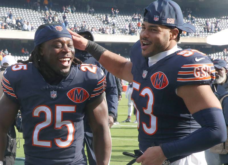 Chicago Bears running back Kyle Monangai celebrates with teamate linebacker T.J .Edwards after defeating the New Orleans Saints on Sunday, Oct .11, 2025 at Soldier Field in Chicago.