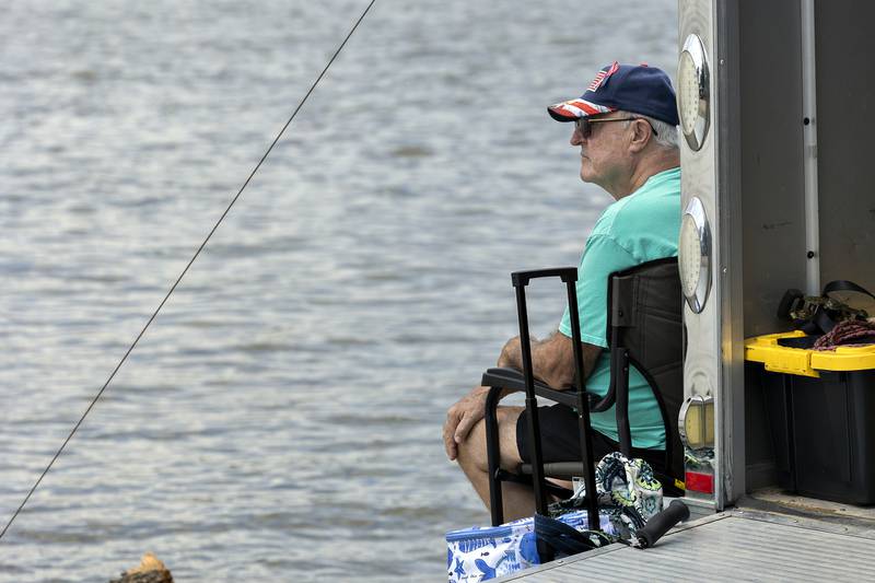 Jim Sendt of Delavan, Wis. watches the races Saturday, July 12, 2025, at Sewards Park in Rock Falls. Sendt’s son and grandson are racers in River Chase.
