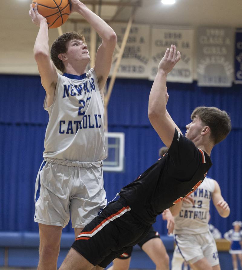 Newman’s John Rozwee puts up a shot against Milledgeville’s Konner Johnson Monday, Feb. 24, 2025, during a Class 1A Regional quarterfinal at Newman High School.