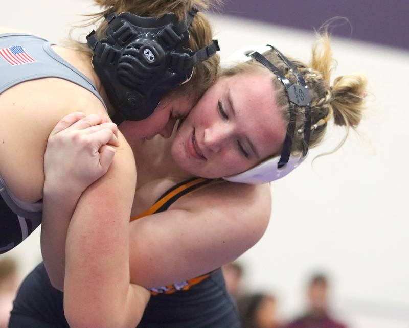 McHenry’s Madalynn Sima battles New Lenox’s Riley Depolo at 170 pounds in Whip-Pur Women’s Classic varsity girls wrestling on Saturday, Dec. 20, 2025, at Hampshire High School in Hampshire.