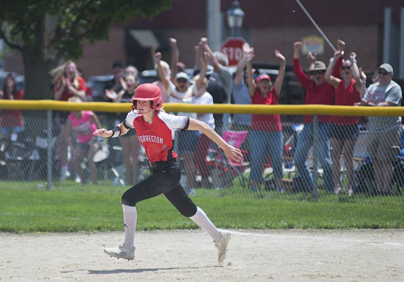 Forreston fans celebrate after Ella Ingram hits a walk-off homer against West Central 6-5 Monday, May 30, 2022. The win propelled the Cardinals to the state tournament.