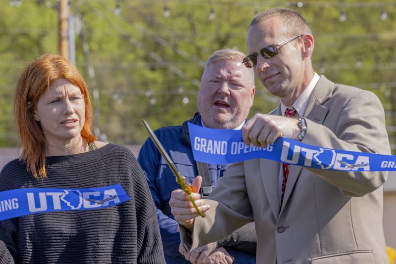Utica Mayor David Stewart cuts the ribbon for the grand opening of Market On Mill on May 3, 2025 in Utica, Illinois.