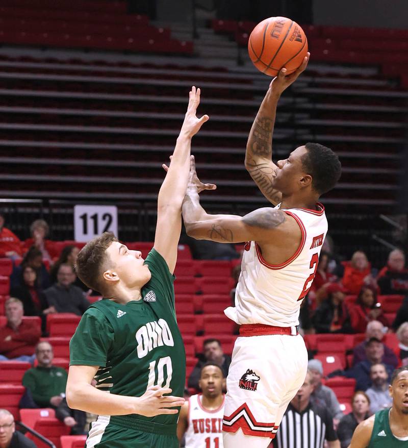 Northern Illinois Huskies guard Zarique Nutter shoots over Ohio Bobcats forward Aidan Hadaway during their game Tuesday, Feb. 7, 2023, in the Convocation Center at NIU in DeKalb.