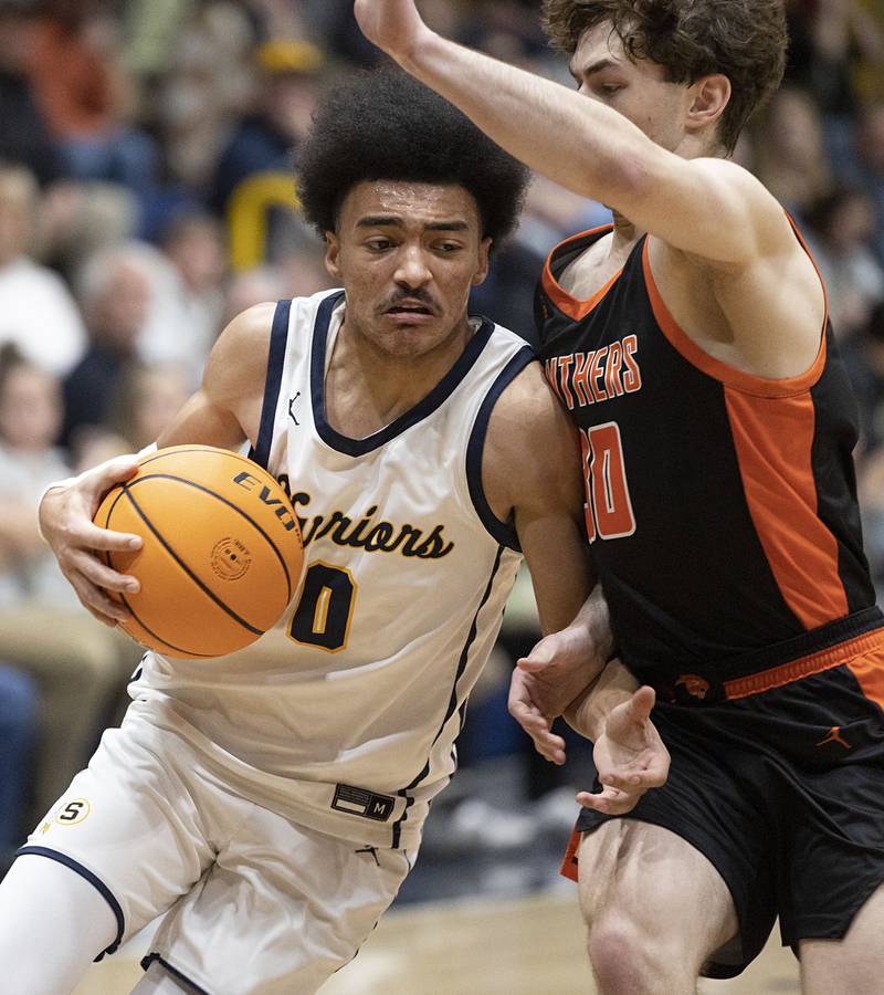 Sterling’s Xavian Prather works against UT’s Tyler Horvath Friday, Jan. 16, 2026.