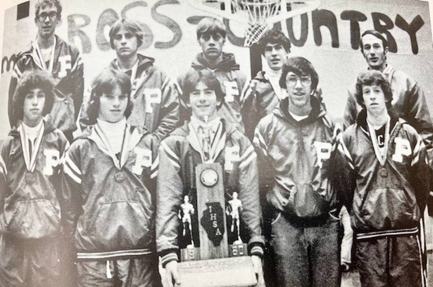 The 1980 Princeton cross country team brought home its second straight Class A second-place state finish. Team members are (front row, from left)  Jaimie Dow, Tom Caldwell, Tom Hodge, Scott Sergerstrom and Dan Darlington; and (back row) Roy Flaig, Leon Archer, Mike Rieker, Dave Larson and Coach Gary Coates.