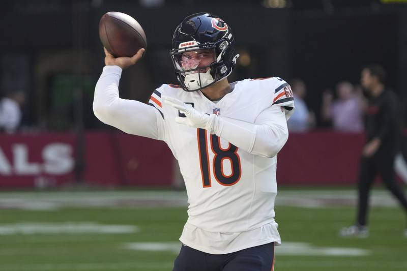 Chicago Bears quarterback Caleb Williams (18) warms up prior to an NFL football game against the Arizona Cardinals, Sunday, Nov. 3, 2024, in Glendale, Ariz. (AP Photo/Rick Scuteri)