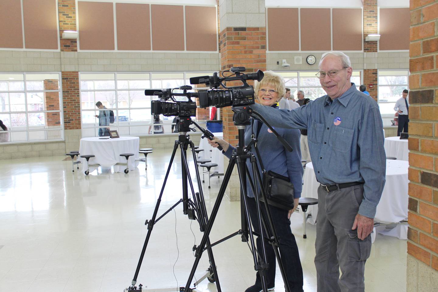 Dick and Millie Schuster, seen with cameras they use to film events for Joliet Community Television, are among inductees into the Joliet Hall of Pride. July 31, 2025
