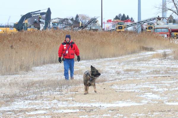 Photos: Search continues in Utica for missing person