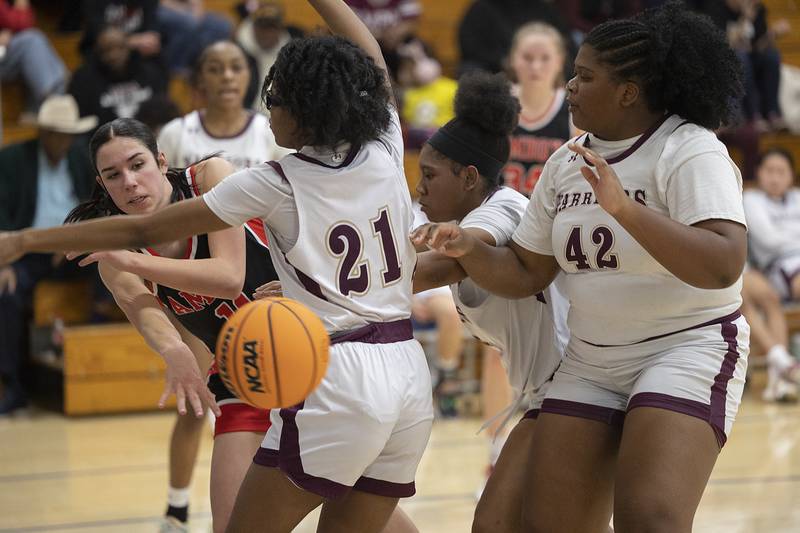 Amboy’s Tyrah Vaessen makes a pass against Morgan Park Academy Tuesday, Feb. 25, 2025, in the Class 1A Hinckley-Big Rock Sectional semifinal. Amboy won 54-26 and will face Elgin St. Edward at 6 p.m. Thursday for the title.