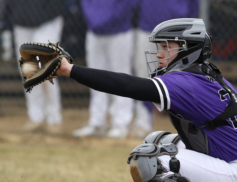 Hampshire's Austin Leonard catches the ball during a non-conference baseball game Wednesday, March 30, 2022, between Marengo and Hampshire at Marengo High School.