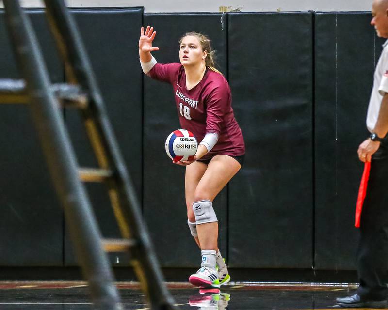 Lockport's Jenna Kolosta (18) serves during Class 4A Bolingbrook Sectional final match between Lockport at Oswego.  Nov 7, 2024  in Bolingbrook.