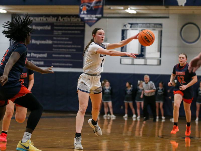 Oswego East's Aubrey Lamberti (1) passes to the corner during their basketball game between Oswego at Oswego East, Feb 10, 2026 in Oswego.