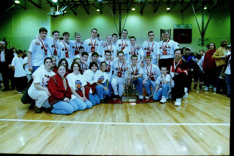 The Hall Red Devils celebrate their 1996-97 state runner-up finish during the community reception at Red Devils Gymnasium.