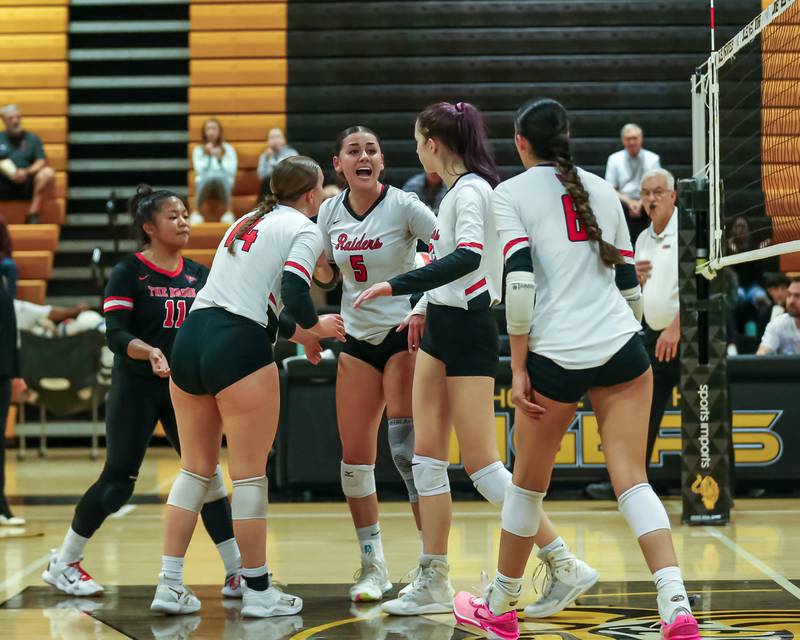 Bolingbrook celebrates a point during regional final volleyball match between Bolingbrook at Joliet West.  Oct 26, 2023.