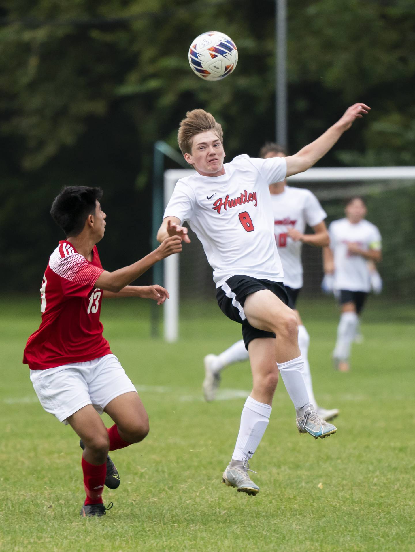 Dundee-Crown's Christian Lechuga and Huntley's Gavin Eagan battle in the air for the ball during their game on Thursday, October 6, 2022 at Dundee-Crown High School in Carpentersville. Dundee-Crown won 1-0.