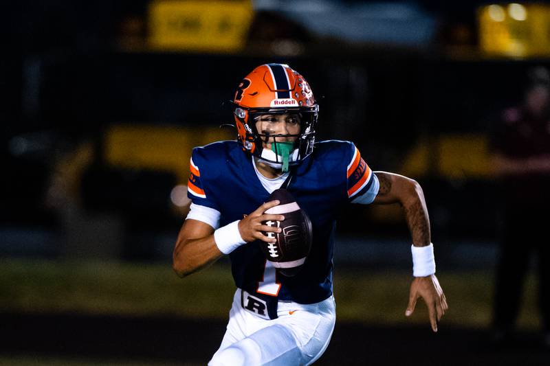Romeoville's Richard Conley runs the ball during a game against Plainfield North on Friday Sept. 19, 2025 at Romeoville High School