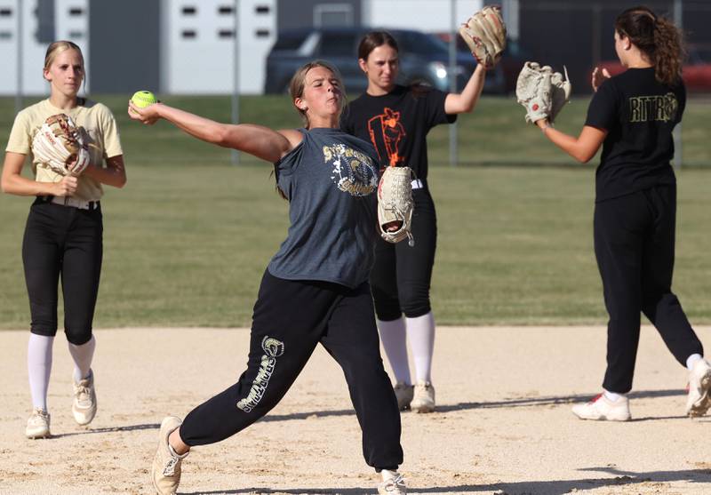 Addison Dierschow, a Kishwaukee Valley Storm 17u and Sycamore High School softball player, throws to first Wednesday, June 26, 2024, during 17u practice at the Sycamore Community Sports Complex. The team is preparing for this weekend’s Storm Dayz softball tournament at the complex which draws dozens of teams from throughout the area.