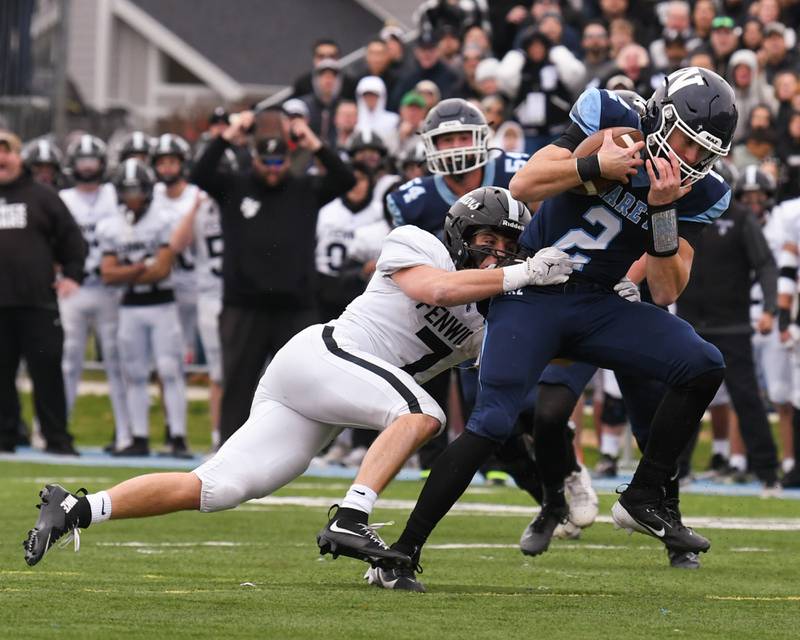 Fenwick's Tommy Thies (7) takes down Nazareth Academy's Jackson Failla (2) during the 6A semifinals game on Saturday Nov. 22, 2025, held at Nazareth Academy High School in La Grange Park.