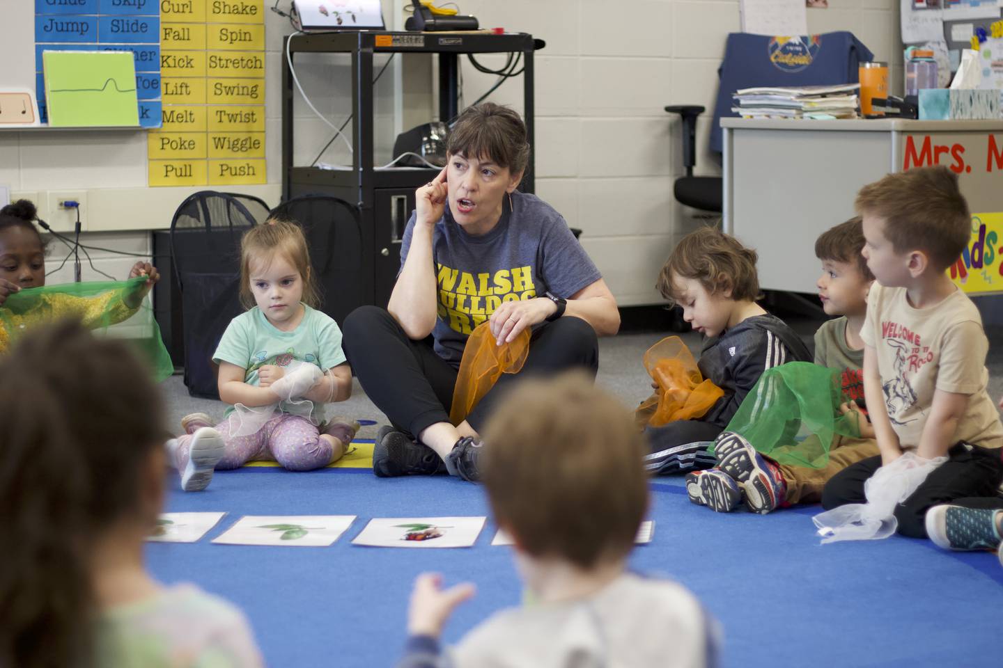 Music teacher Joanne Moan engages in a scarf activity with her students on April 29, 2025 at Walsh Elementary School, 514 MacGregor Road, Lockport.