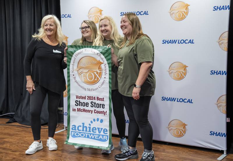 Katie Van Diggelen, left to right, Nicole Kelly, Diane Wasilk and Brett Van Diggelen of Achieve Footwear in Crystal Lake pose for a photo after being voted by readers for the 2024 Best Shoe Store in McHenry County during the Northwest Herald Best of the Fox awards ceremony on Thursday, September 19, 2024 at Lou's Lounge at the Dole Mansion in Crystal Lake. Ryan Rayburn for Shaw Local