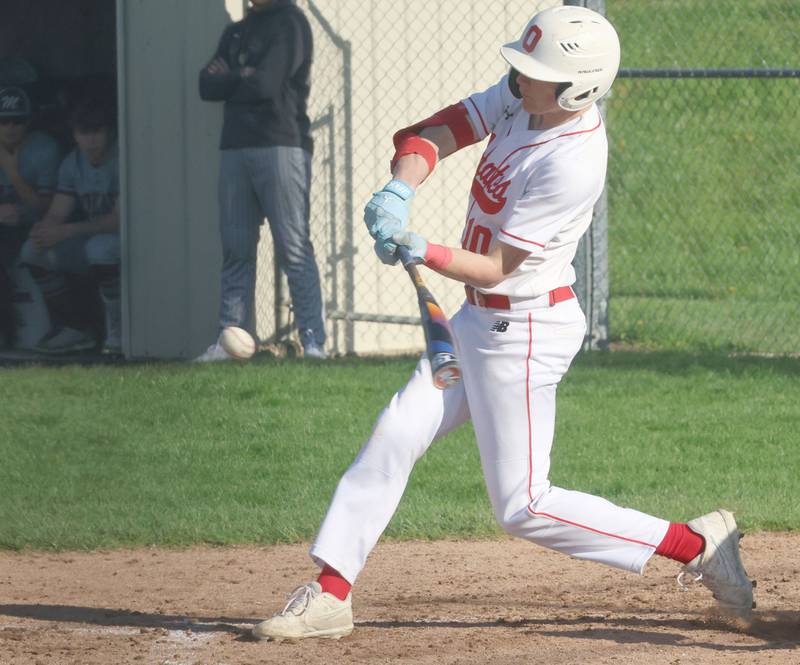 Ottawa's George Shumway makes contact with the ball against Morris on Monday, April 20, 2026 at Ottawa High School.