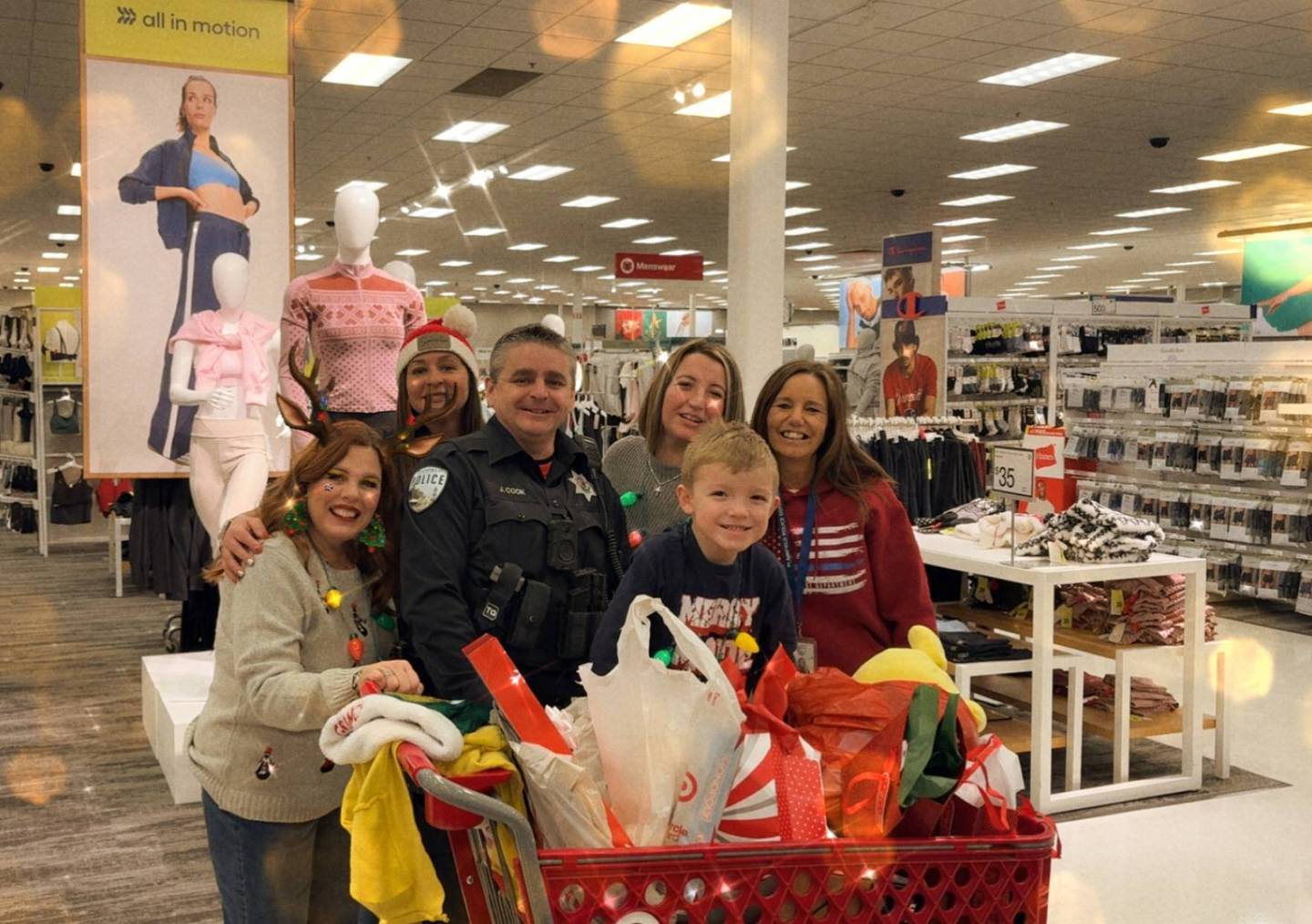 Plainfield police took local children shopping at Target as part of their Shop With a Cop Event on Friday, Dec. 19.