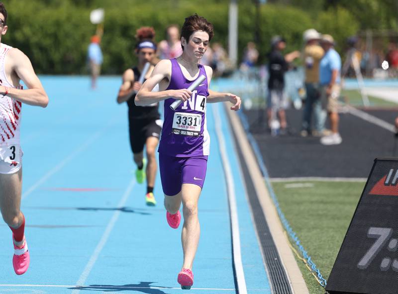 Downers Grove North’s Ryan Eddington crosses the finish line second in the Class 3A 4x800 Relay State Finals on Saturday, May 27, 2023 in Charleston.