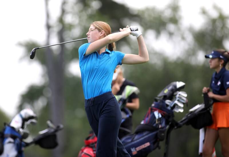 Wheaton North’s Lizzie Elftmann tees off during the Class 2A Glenbard North Regional girls golf meet at Bloomingdale Golf Club on Thursday, Sept. 28, 2023.