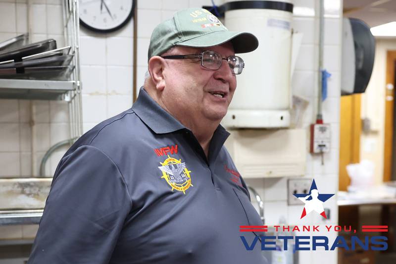 Lou Smith, a Navy and Vietnam veteran, makes visit to the kitchen at the VFW Cantigny Post 367 in Joliet on Friday, Oct. 20.