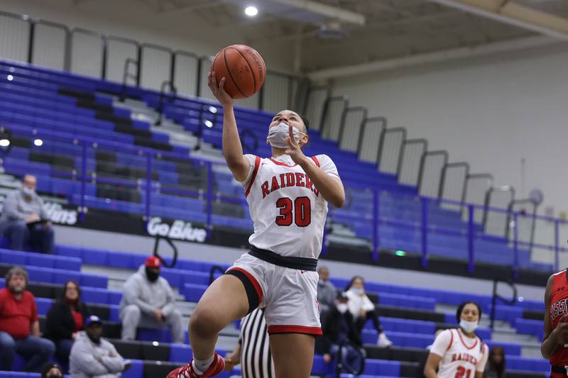Bolingbrook’s Angelina Smith goes in for the uncontested lay up against Eisenhower in the Class 4A Lincoln-Way East Regional semifinal. Monday, Feb. 14, 2022, in Frankfort.