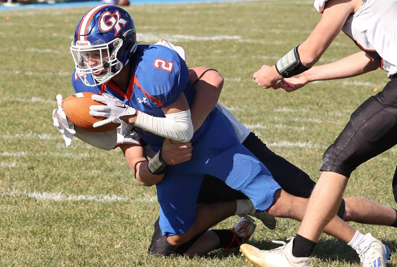 Genoa-Kingston's Traven Atterberry dives for the goal line with an Elmwood defender in tow during their first round playoff game Saturday, Oct. 29, 2022, at Genoa-Kingston High School.